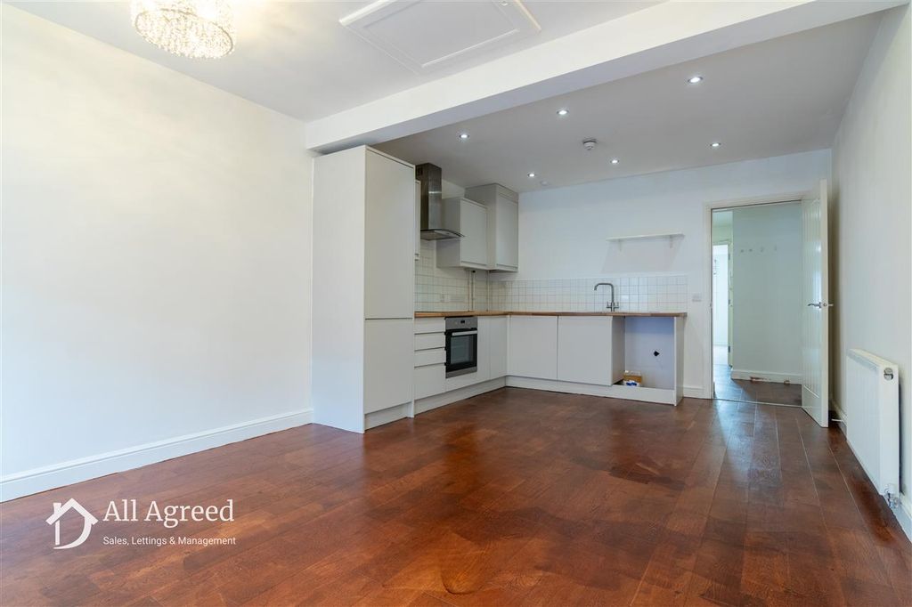 Property photo 3 of 8 Kitchen / Living Room