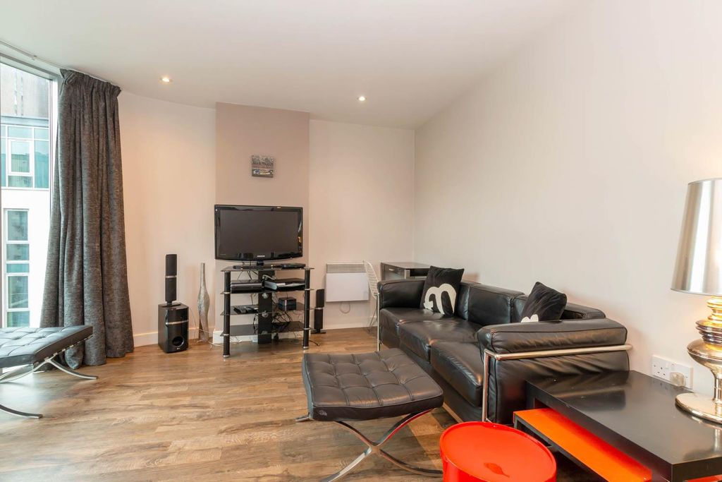 Property photo 2 of 11 Living Area