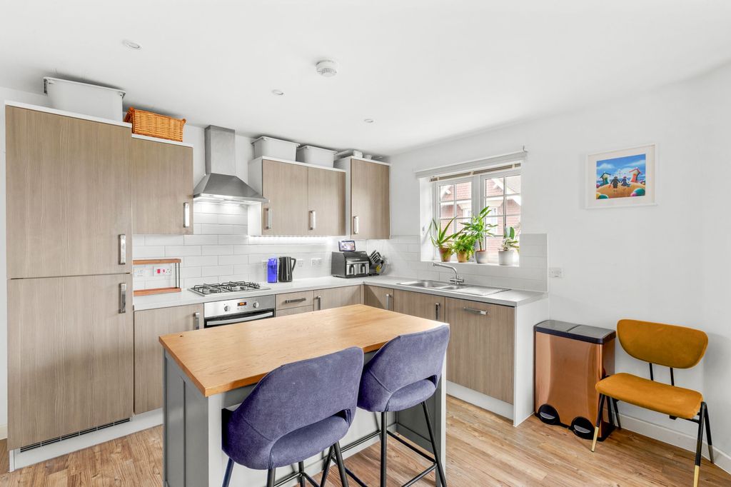 Property photo 3 of 9 Kitchen Area