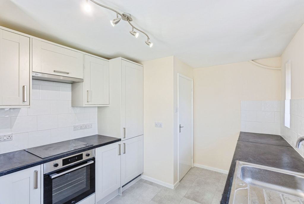 Property photo 3 of 12 Kitchen