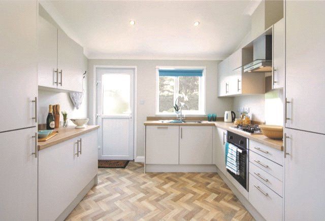 Property photo 3 of 11 Kitchen