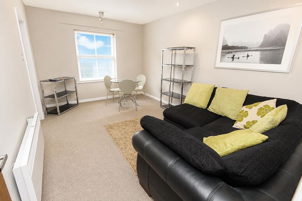 Property photo 2 of 7 Bright Lounge With Comfy Seating And Dining Area...