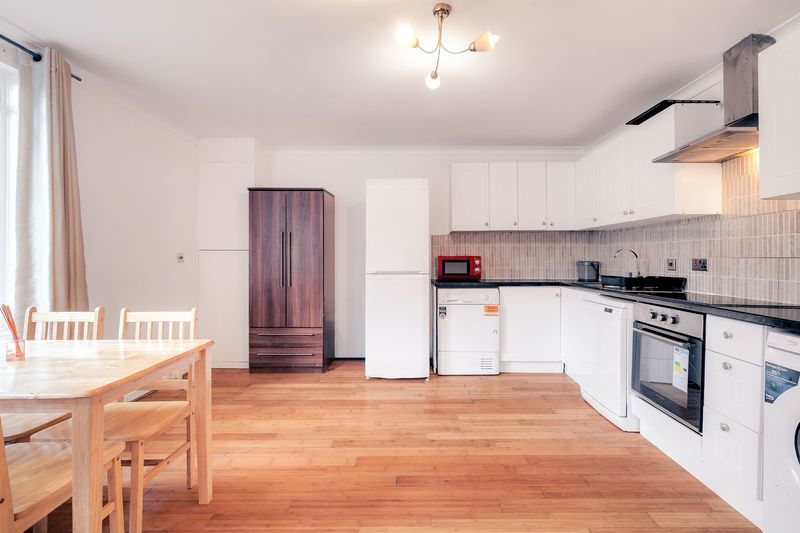Property photo 2 of 10 Kitchen & Living Area