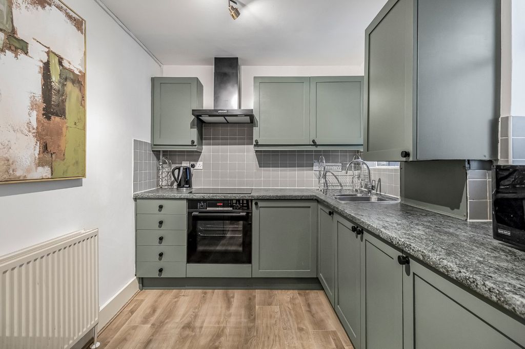 Property photo 2 of 8 Kitchen