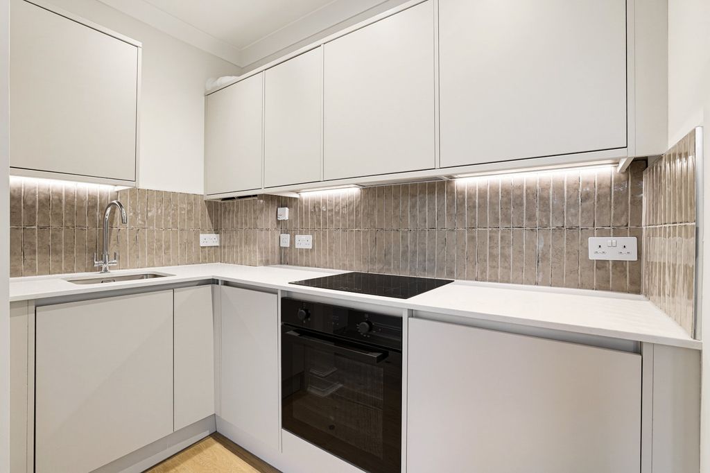 Property photo 3 of 6 Kitchen Area