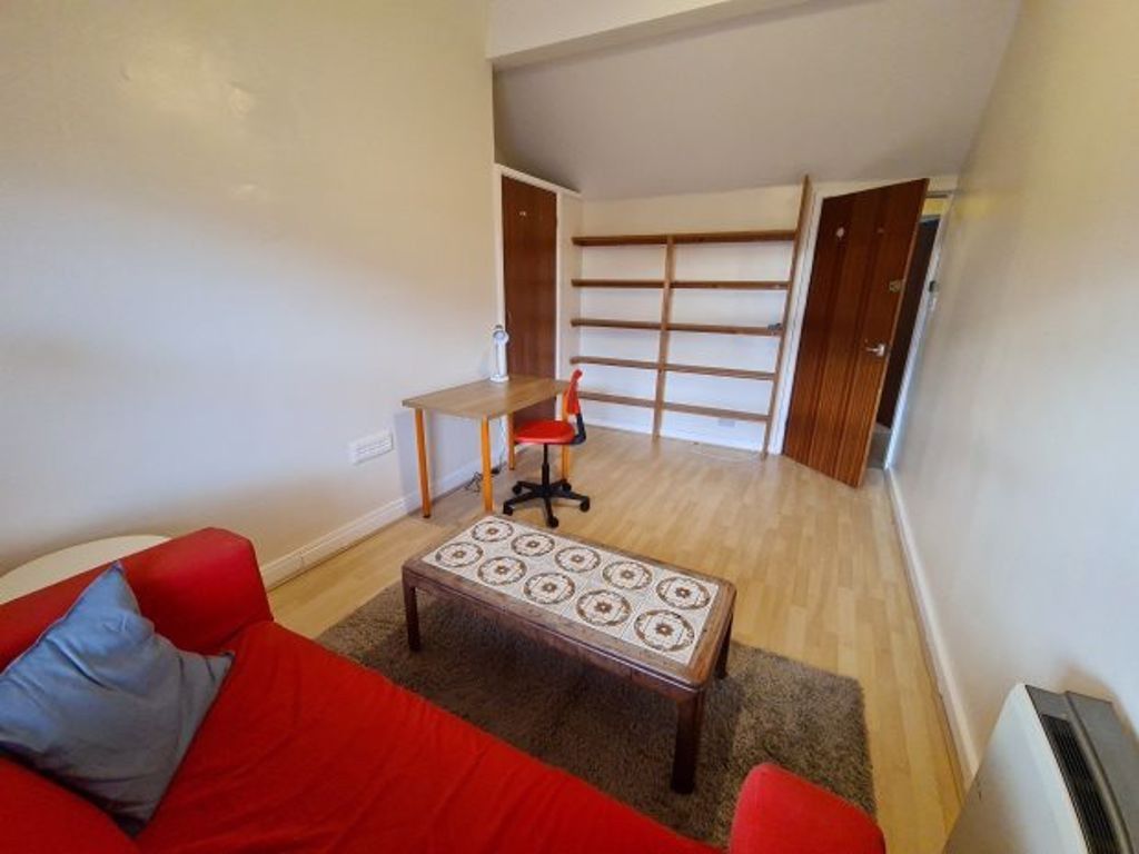 Property photo 2 of 5 Bright Furnished Bedroom With A Red Sofa, Patterne...