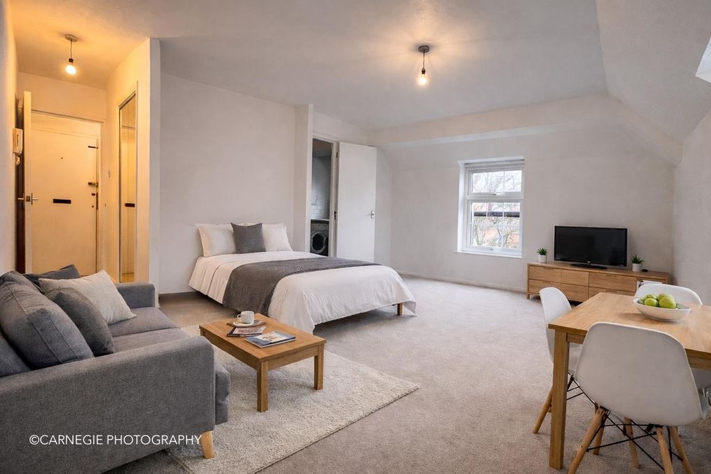 Property photo 1 of 13 Living Area