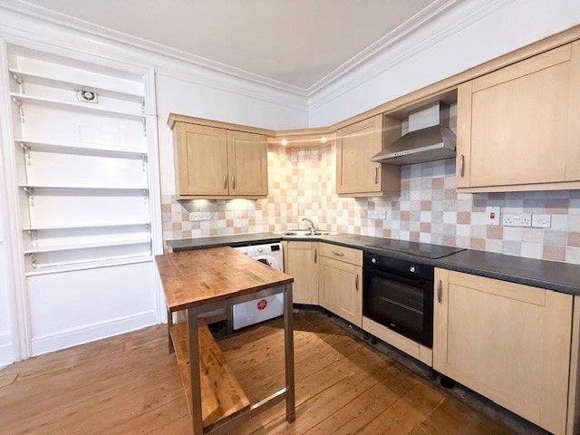 Property photo 3 of 8 Kitchen