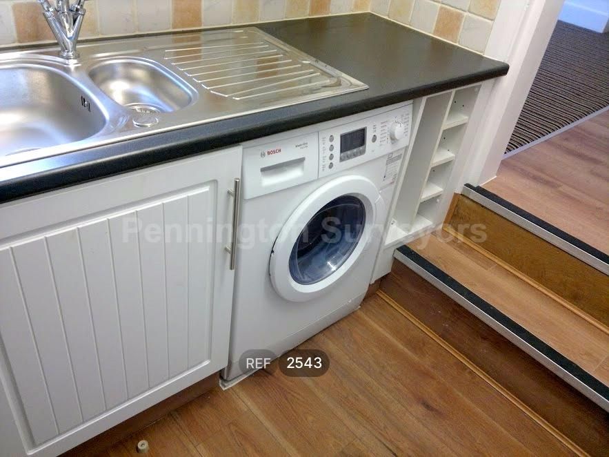 Property photo 3 of 7 Kitchen