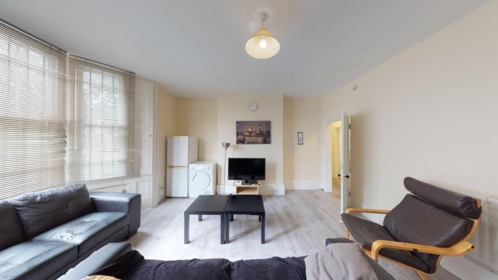 Property photo 2 of 8 A Bright And Inviting Contemporary Living Room Fea...