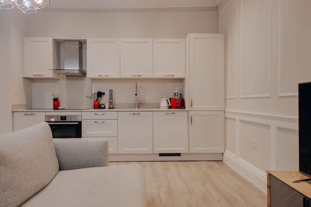 Property photo 3 of 8 Kitchen