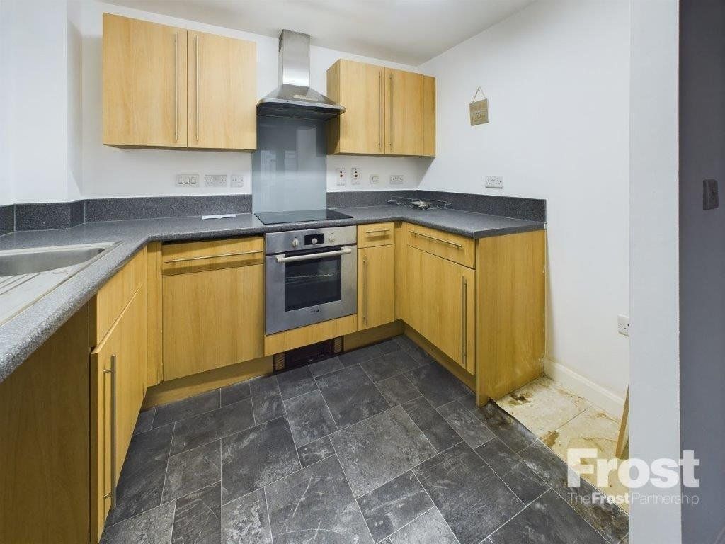 Property photo 3 of 7 Kitchen