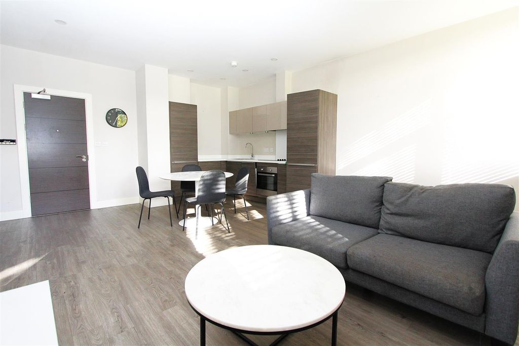 Property photo 1 of 6 Bright Open-Plan Lounge With Modern Kitchen Area...