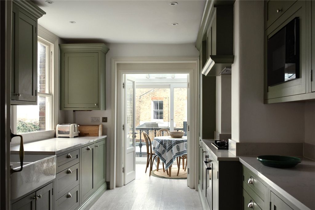 Property photo 3 of 12 Kitchen