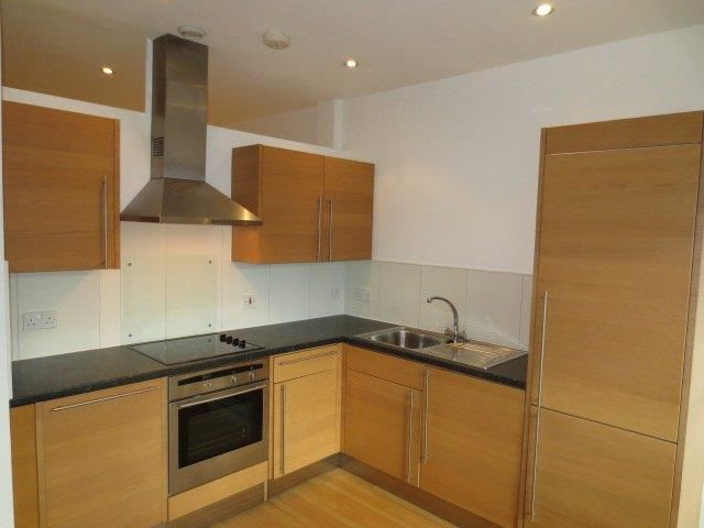 Property photo 1 of 8 Kitchen