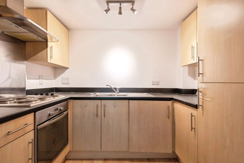 Property photo 3 of 12 Kitchen