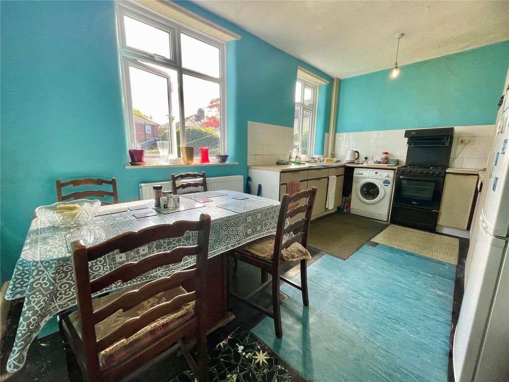 Property photo 3 of 12 Dining Kitchen
