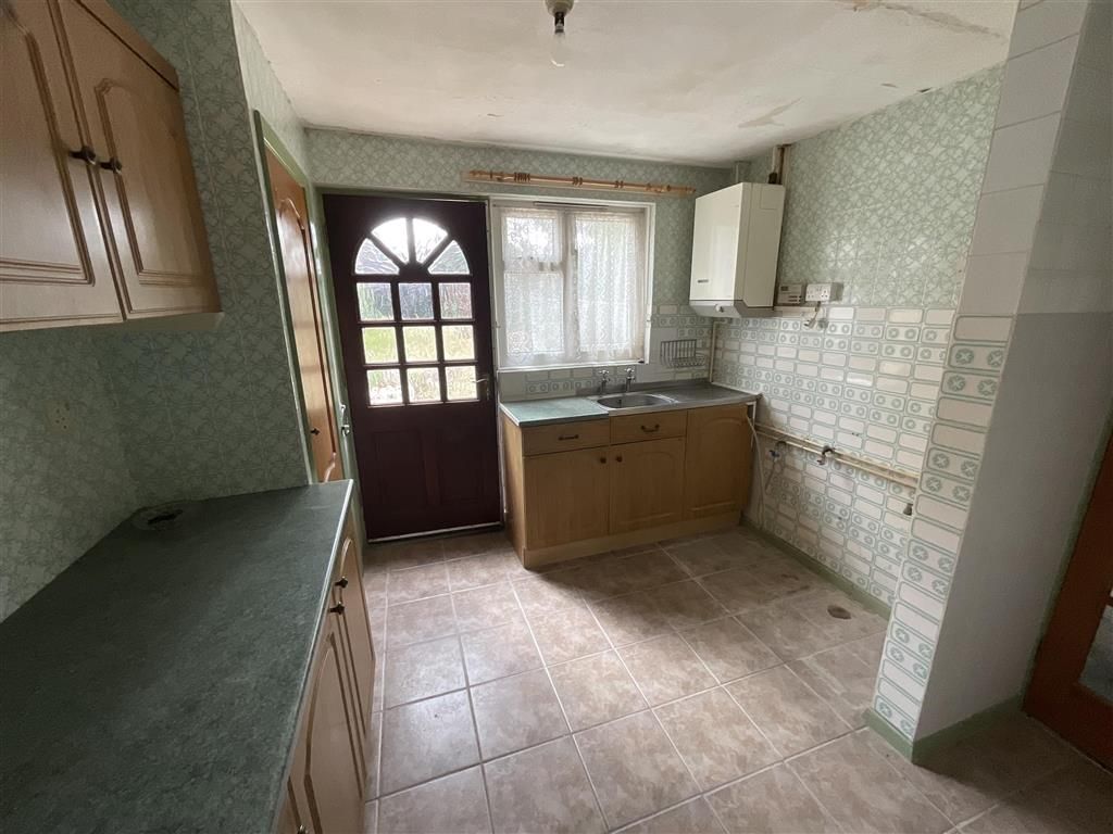 Property photo 3 of 7 Kitchen