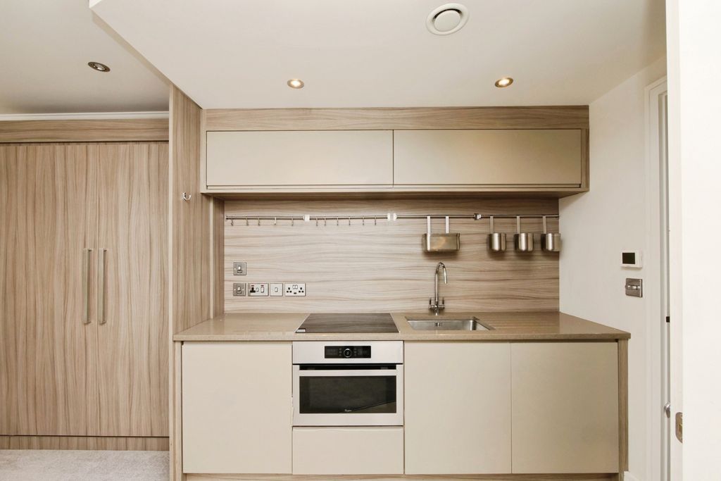 Property photo 3 of 12 Kitchen