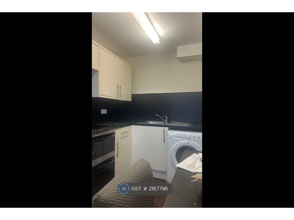 Property photo 3 of 10 Kitchen Side View