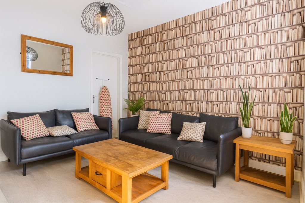 Property photo 3 of 7 Bright, Stylish Living Room With Two Black Leather...