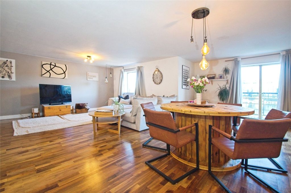 Property photo 3 of 26 Living/Dining Area