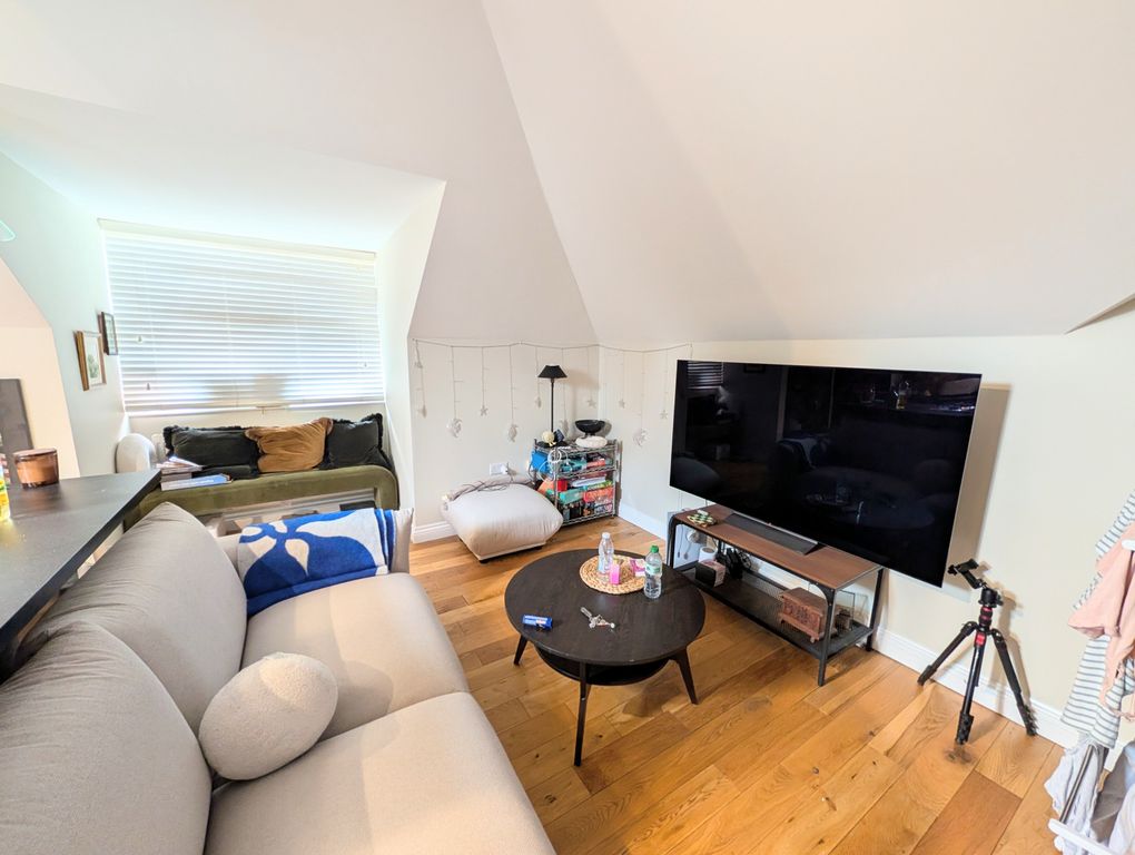 Property photo 3 of 10 Living Area