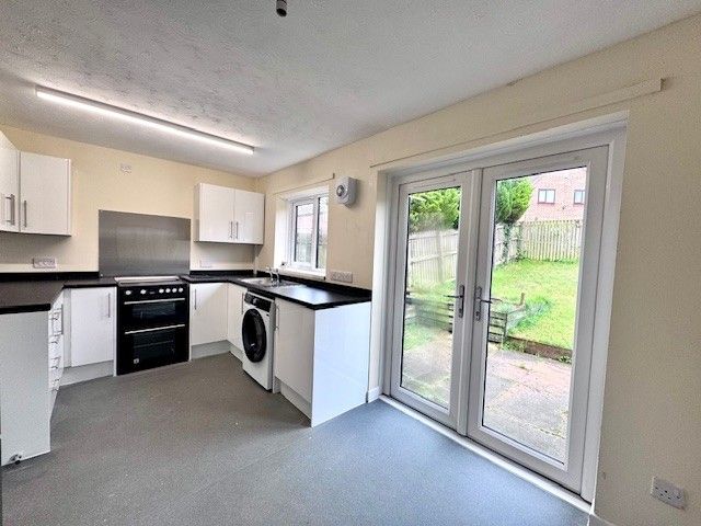 Property photo 3 of 13 Kitchen