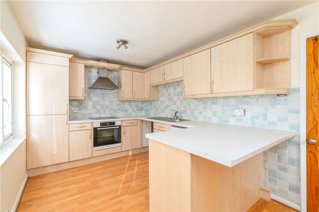 Property photo 3 of 12 Dining Kitchen