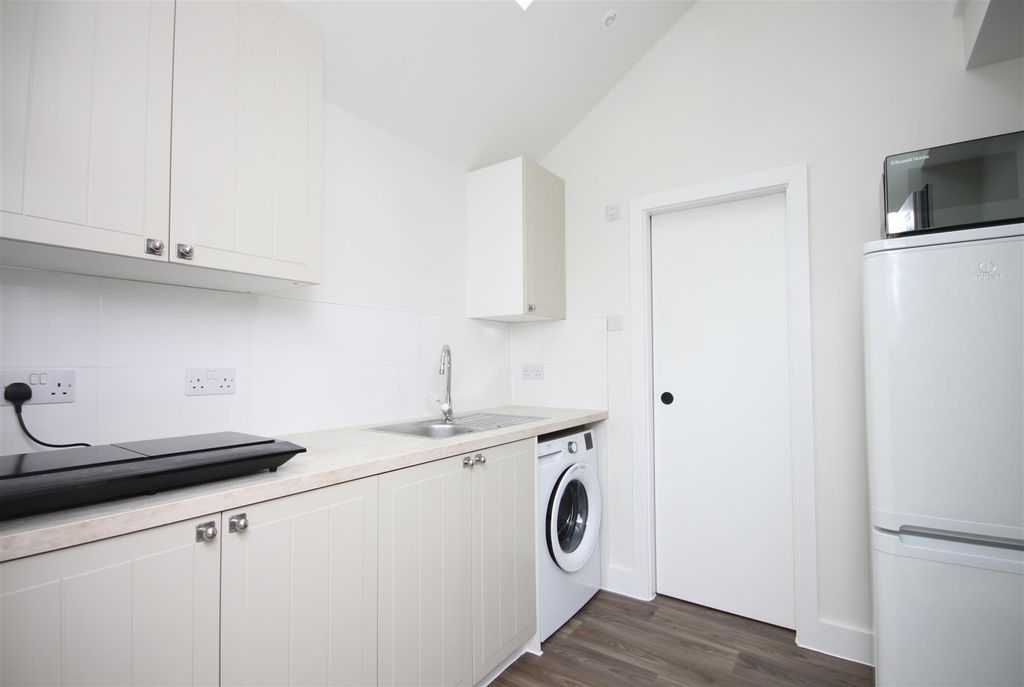 Property photo 3 of 9 Kitchen Side On.Jpg