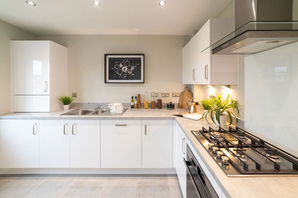 Property photo 3 of 11 Typical Kitchen