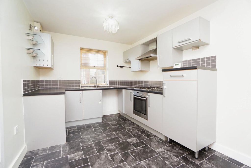 Property photo 2 of 12 Kitchen