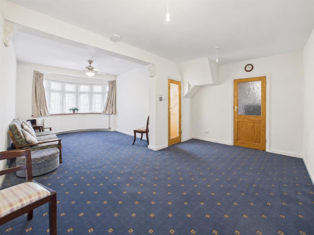 Property photo 2 of 10 Bright Bay-Window Living Room Interior.Png