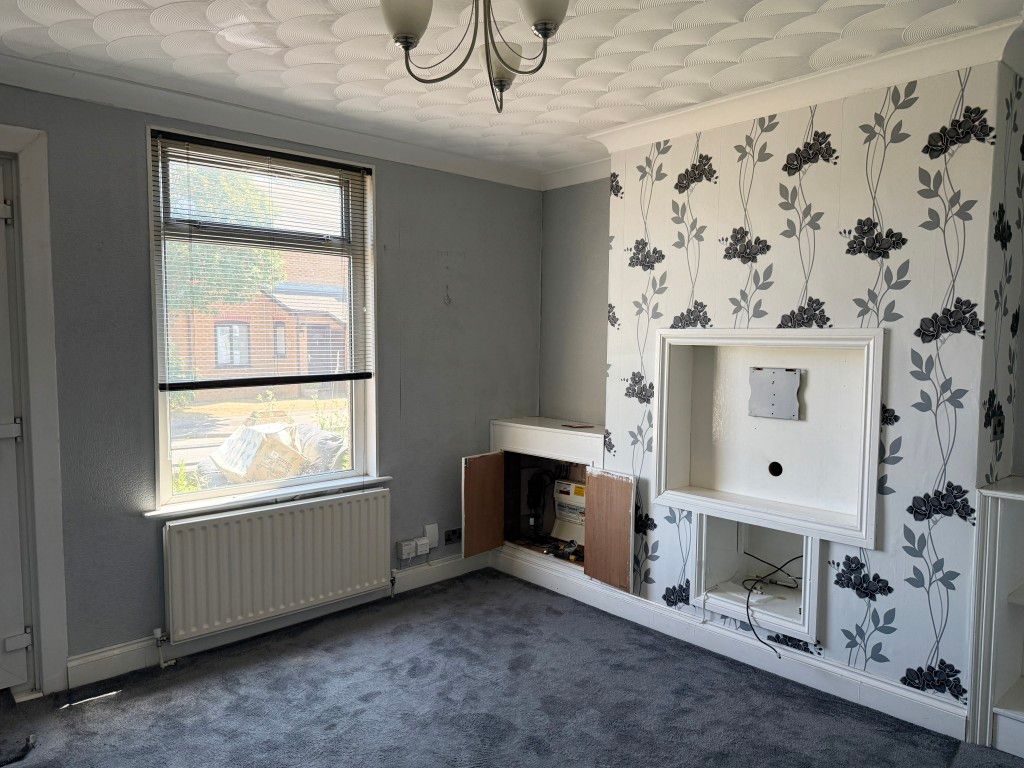 Property photo 3 of 11 Living Room In House In Need Of Refurbishment
