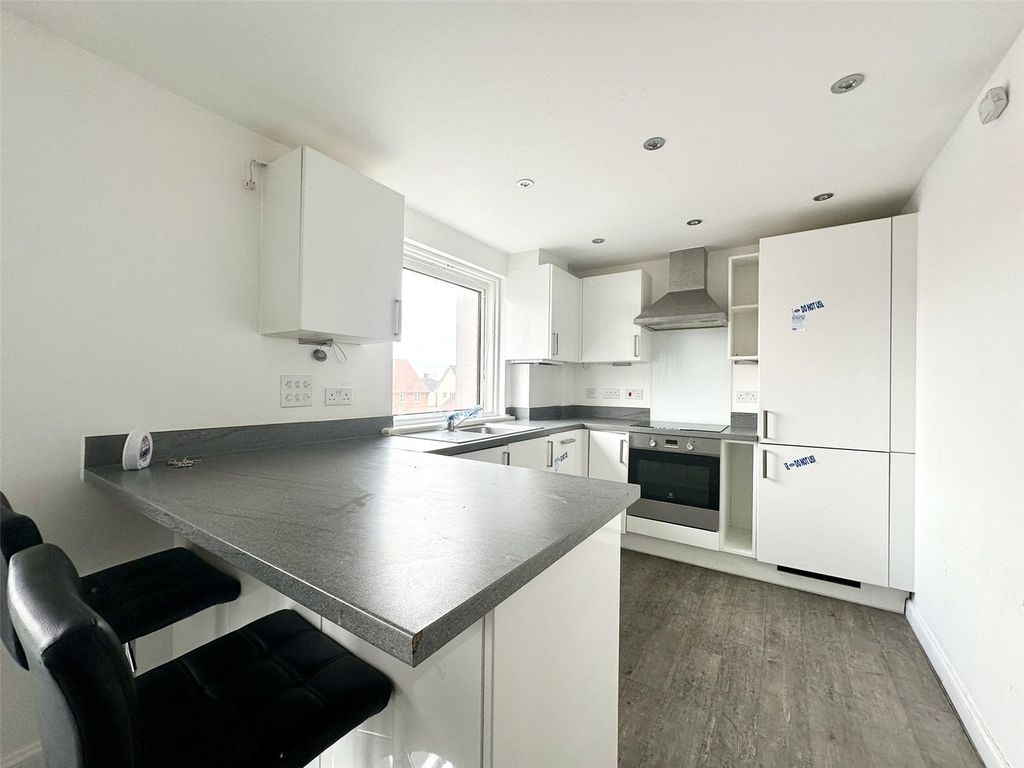 Property photo 2 of 13 Kitchen Area
