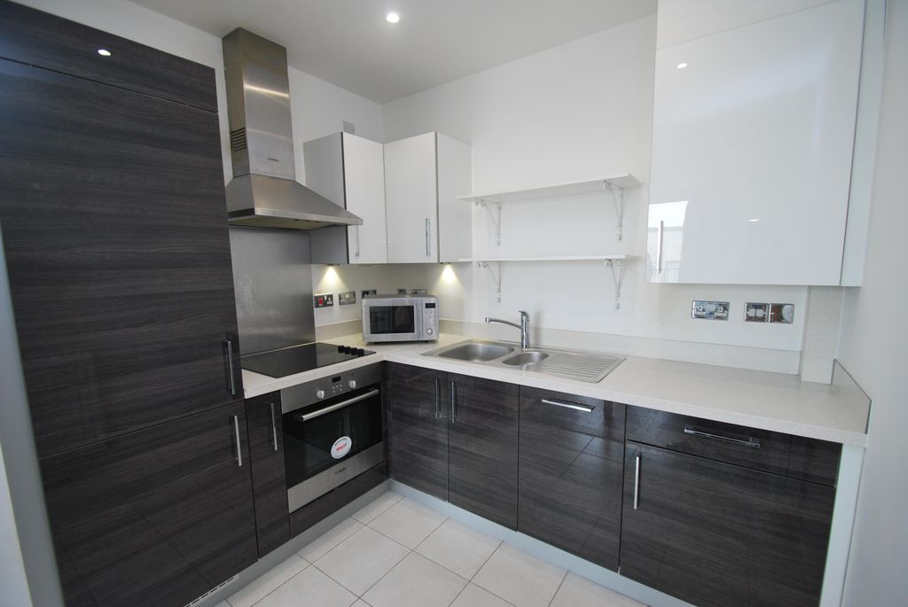 Property photo 3 of 8 Kitchen