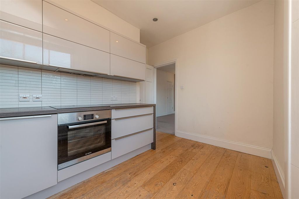 Property photo 3 of 9 Kitchen