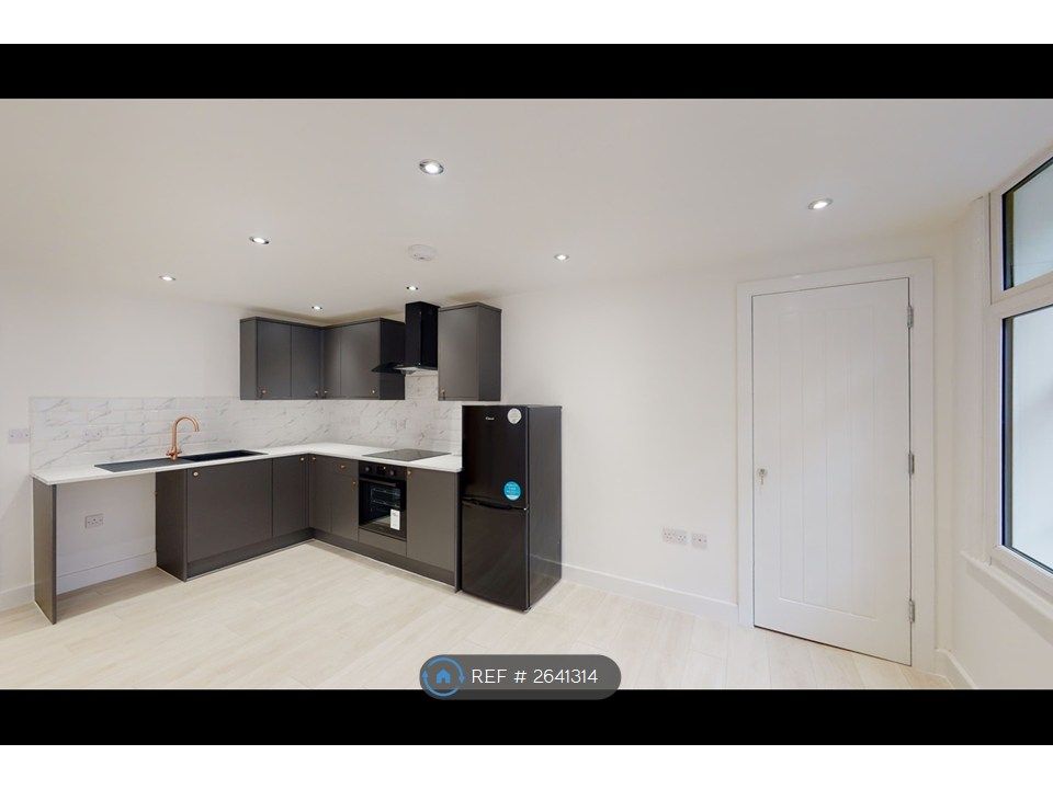 Property photo 3 of 8 Kitchen/Living Area