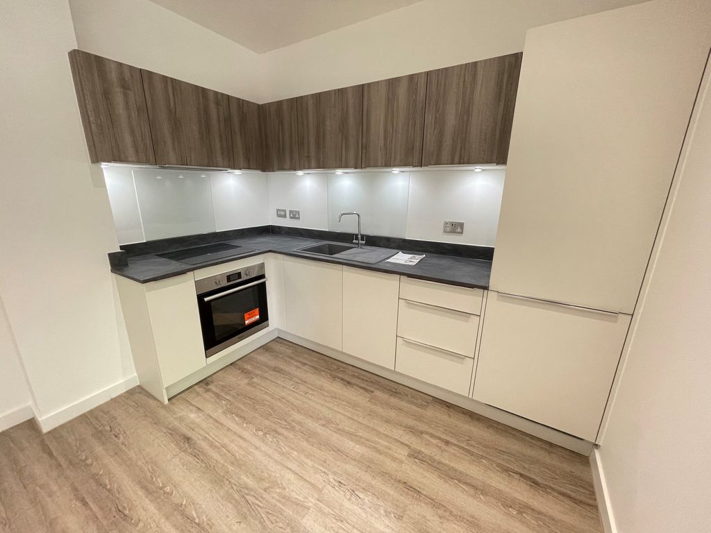 Property photo 3 of 7 Kitchen Area