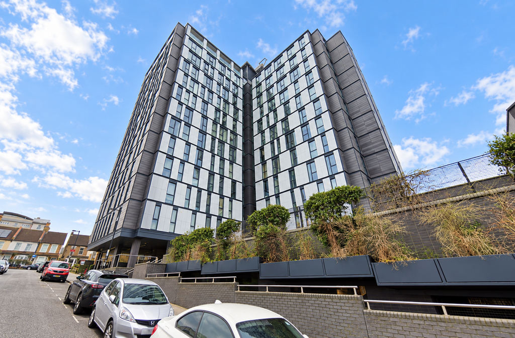 Property photo 1 of 7 Modern Angular Apartments Beneath A Blue Sky.Png