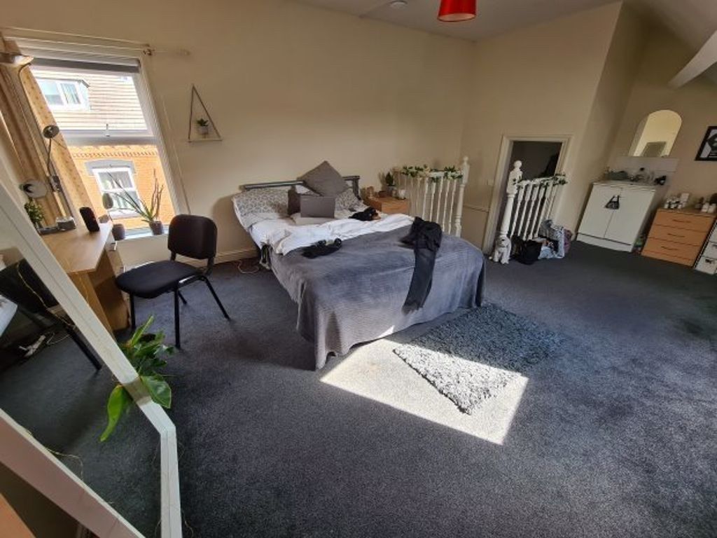 Property photo 1 of 10 Spacious Master Bedroom Featuring A Large Bed, Amp...