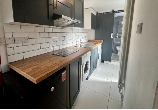 Property photo 2 of 7 Kitcen