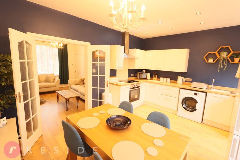 Property photo 3 of 12 Dining Kitchen