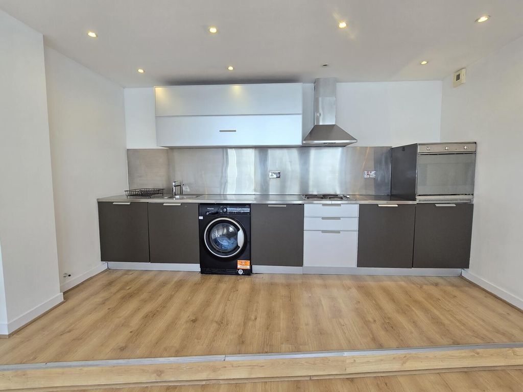 Property photo 2 of 12 Kitchen