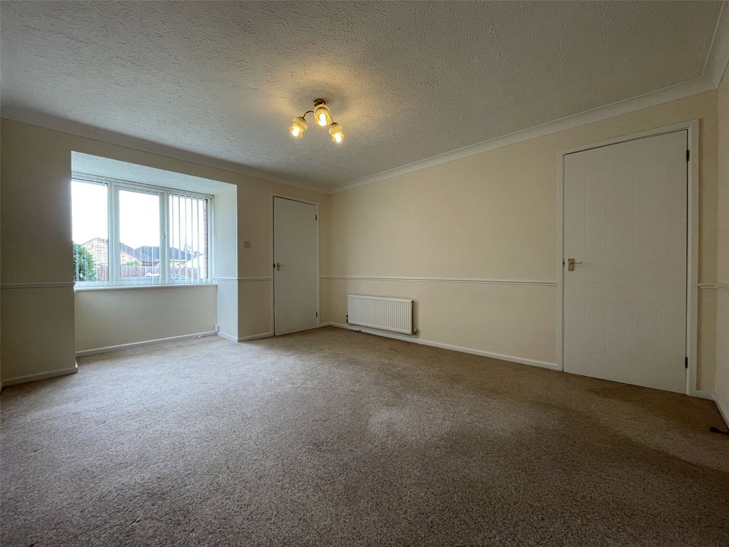 Property photo 3 of 8 Sitting Room