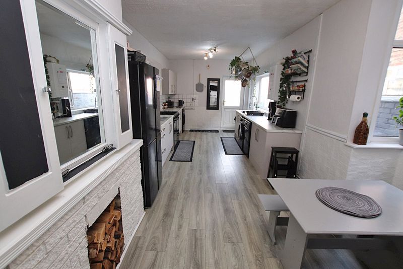 Property photo 3 of 13 Dining Kitchen