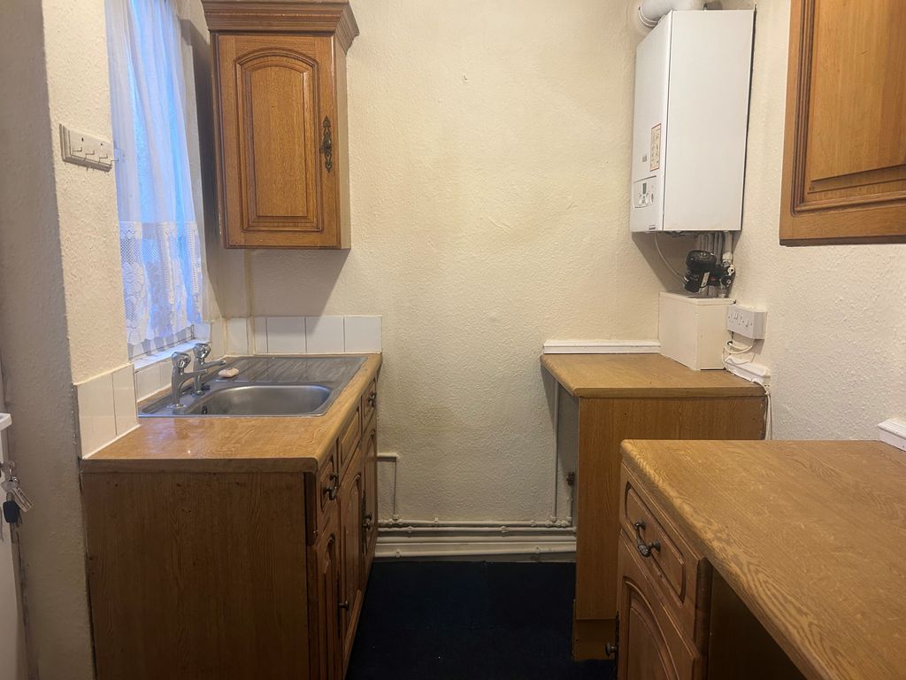 Property photo 3 of 12 Kitchen