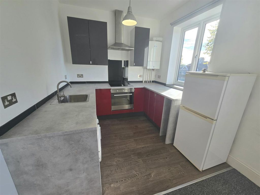 Property photo 2 of 7 Kitchen Area