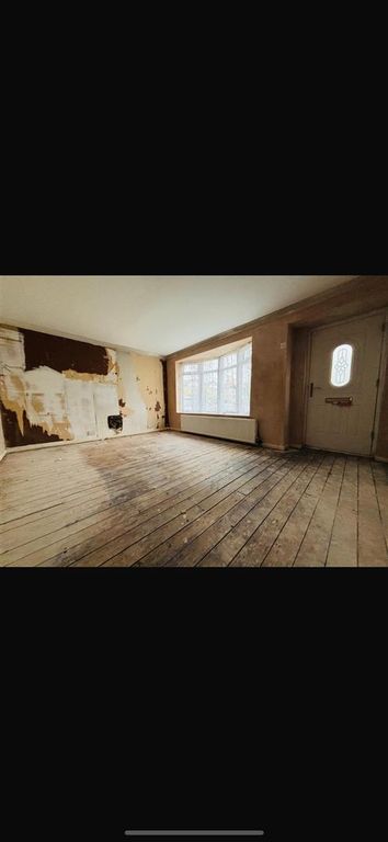 Property photo 3 of 13 Living Room: