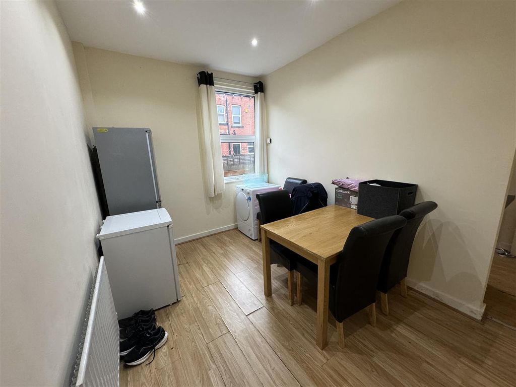 Property photo 2 of 7 A Bright, Modern Living Room Featuring A Window Wi...